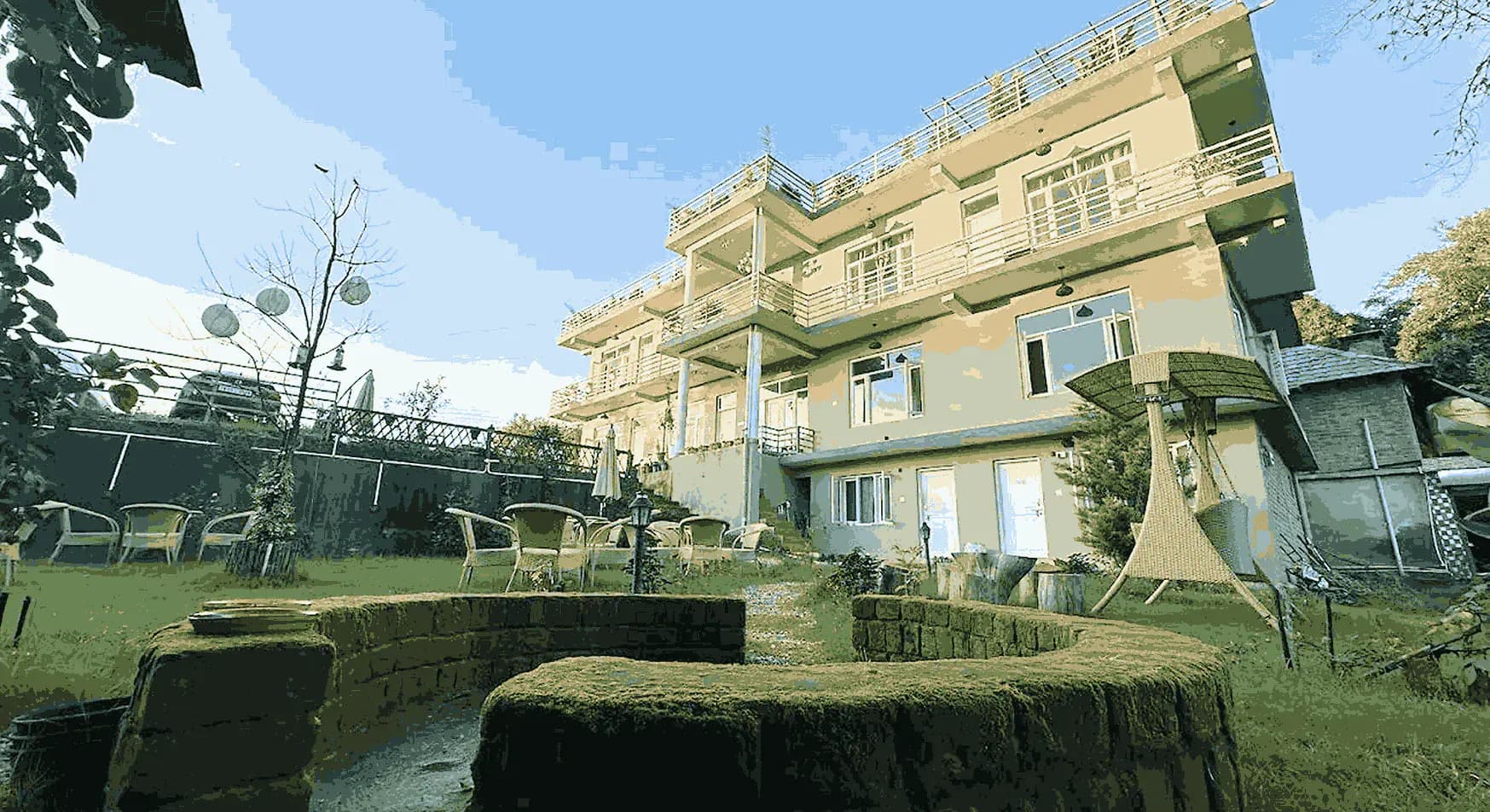 The Lumi Hotels property and garden in Bir